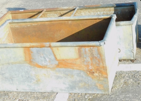 A galvanized rectangular animal feeder, 41cm high, 92cm wide.