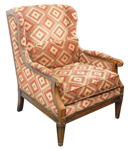 A Wrangler Home mahogany armchair in 18thC style, upholstered in carpet style fabric with studded borders. The upholstery in this lot does not comply with the 1988 (Fire & Fire Furnishing) Regulations, unless sold to a known exporter or upholsterer it wi