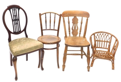 A small group of chairs, a bentwood chair with label for Fischel, a child's rattan chair, an Edwardian side chair and a kitchen chair. (4)