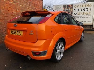 A 2006 Ford Focus ST-2 Sports 5-door Hatchback, registration WU56 OYJ, 2500cc in line five cylinder, c/w Ford Approved Mountune upgrade to 260bhp, ASBO orange with black roof, 132,911 recorded miles with full MOT (current to expire 6th January 2023) and s - 2