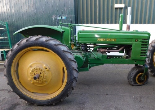 A 1941 John Deere Agricultural Tractor, registration JE 6347, diesel, first registered 31/12/1941, V5 present, later restored, together with a group of accessories comprising a John Deere AN tool kit, socket for cylinder head nuts, wrench for connecting r