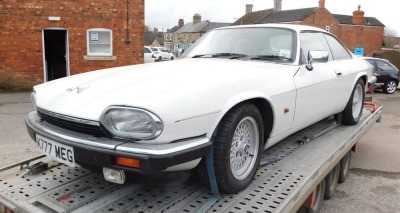 A 1993 Jaguar XJ-S Sports Coupe, registration K777 MEG, currently on SORN, last MOT expired 3rd July 2019, unlocked without keys, known mileage 125,803, no V5. To be sold upon instructions from the Executors of Susan Gaisford (Dec'd). - 2