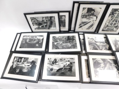 A group of automobilia prints, comprising framed black and white prints of car production, spraying and making, each framed and glazed, 46cm x 34cm. (AF) (2 boxes) - 2