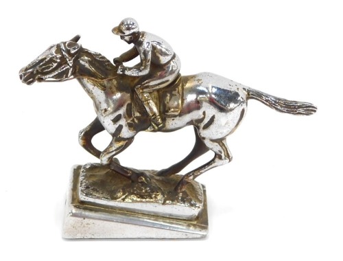 A chrome car mascot, of a jockey on horseback, 13cm high.