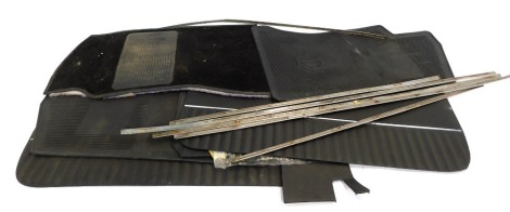 A group of MG car mats, boot liner and door trims. (a quantity)