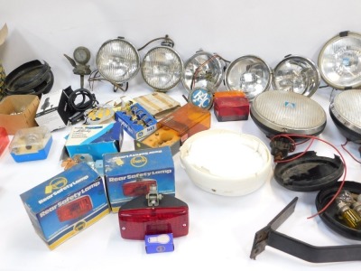 A group of motoring parts, comprising bulbs, indicator lights, head lamps, cased set, Citroen lamps, Butlers cased headlamps, steering wheel, etc. (2 boxes) - 3