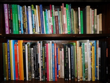 A group of hardback Steam and Railway related books, British Railways Steaming on the Ex LNER Lines, The Stanmore and Eden Valley Railways, LMR, Scottish Classes, Along Country Lines, etc. (2 shelves)