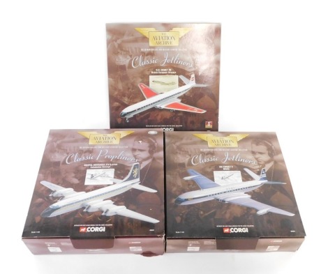 Corgi diecast The Aviation Archive Classic Jetliners and Propliners, 1:144 scale, comprising Bristol Britannia 314 G-ATNZ 'Caledonian Airways', De Havilland Comet 4B 'British European Airways' and De Havilland Comet 4 'BOAC'. (3)