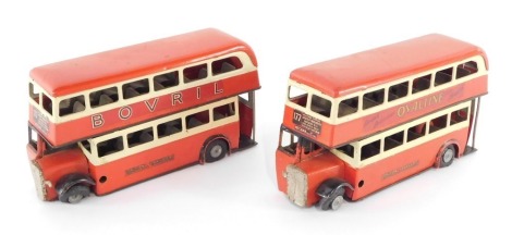 Two Tri-ang Minic tin plate clockwork double decker buses, No 177 Mitcham, in London Transport red, with advertising decals for Bovril and Ovaltine. (AF)