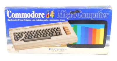 A Commodore 64 Microcomputer, boxed.