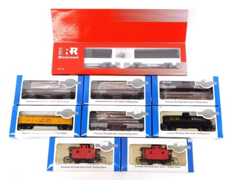 Rivarossi and Bachmann Silver Series HO gauge rolling stock, to include 4T single dome tank car, Bobber cabose, log cars with logs, Rivarossi log car St Regis Paper Company, etc., all boxed (9)