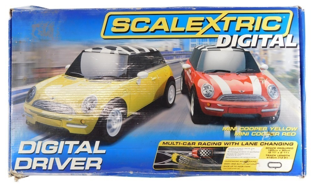 A Scalextric digital slot car set Digital Driver C1197 including two Mini Coopers boxed. 1