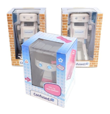 Confused.com promotional toys, comprising two Brian the robot and Miss Herbert, boxed. (3)