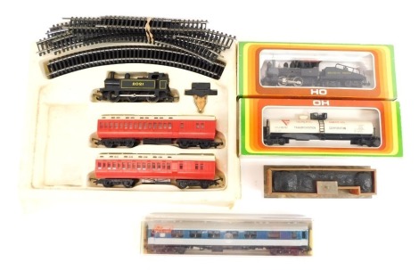 A Hornby OO gauge train set, Liliput HO gauge coach, a HO gauge locomotive Southern Pacific number 14, and a General American Transportation Corporation Tanker.