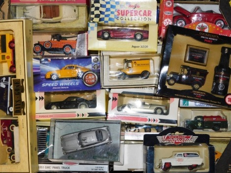 Lledo and Maisto die cast vehicles, including a Jaguar XJ 220, a 1953 Pontiac delivery van, Porsche 959, BMW Z1, etc. (1 box)