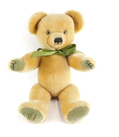 A Merrythought Teddy Bear made Exclusively for Harrods, mohair, with wool felt feet.