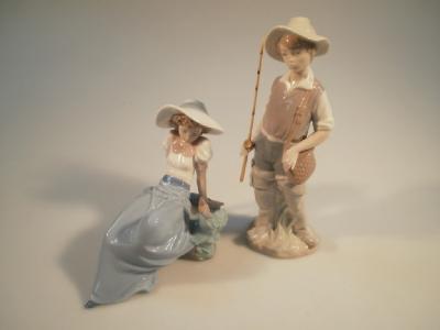 A Lladro figure of a fisherman and another Lladro figure of a seated young woman