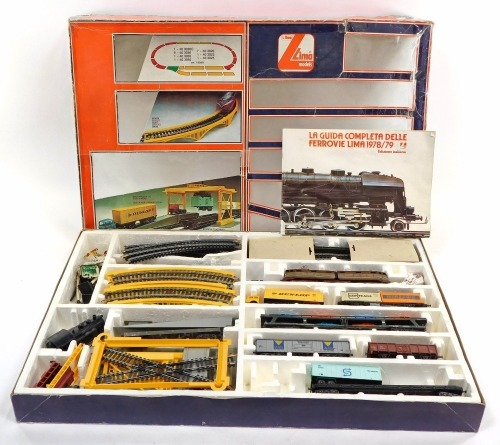 A Lima HO gauge Road to Rail train set, including locomotive, rolling stock, container unloader, track, etc, boxed.