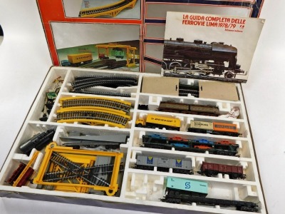 A Lima HO gauge Road to Rail train set, including locomotive, rolling stock, container unloader, track, etc, boxed. - 2