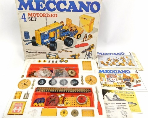 A Meccano no.4 motorised construction set.