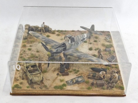 A 1:32 scale diorama of a Messcersmit ME109-G, in perspex case.