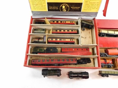 A Trix Twin Railway three rail locomotive and rolling stock, including 0-4-0 locomotive and tender, coaches, wagons, etc. (1 box and loose) - 2