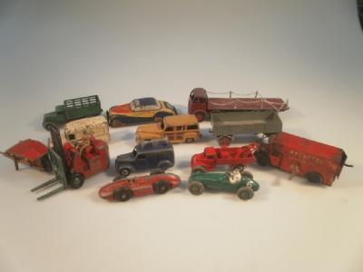 A small collection of Dinky and other vehicles including a Foden flat back lorry