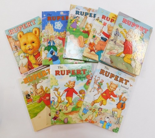 The Daily Express Rupert Annuals, including 1986, 1981, etc. (1 shelf)