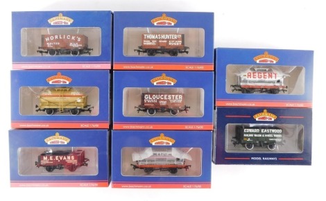 Bachmann Branchline OO gauge rolling stock, including 37-02016K seven plank end door wagon, red oxide, 37-2009K seven plank end door wagon Thomas Hunter Limited, 372014K 14 tonne tank wagon military supply pool wagon, 37-2012K seven plank wagon Gloucester