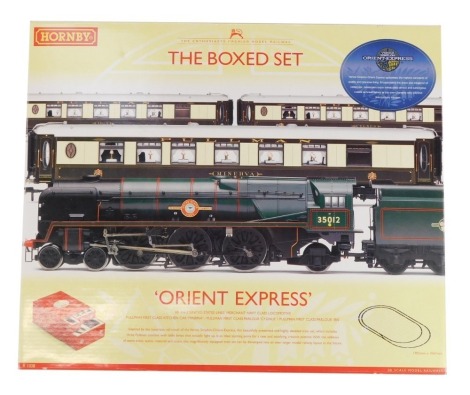 A Hornby OO gauge Orient Express The Boxed Set, comprising Merchant Navy Class United States Lines locomotive, Pullman First Class Kitchen Car Minerva, Pullman First Class Parlour Class Cygnus, Pullman First Class Parlour Car Ibis, H & M power controller,