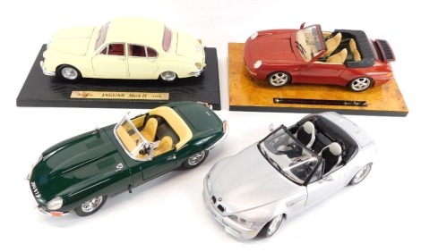 Burago and Maisto die cast cars, 1:8 scale, comprising E-Type Jaguar, BMW M Roadster, Porsche 911 Carrera and a Maisto Jaguar MkII 1959. (4)