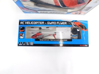 Radio controlled vehicles, comprising a Tyco RC Sea Arrow, RC Helicopter, and a Heliway RC Helicopter. (3) - 2