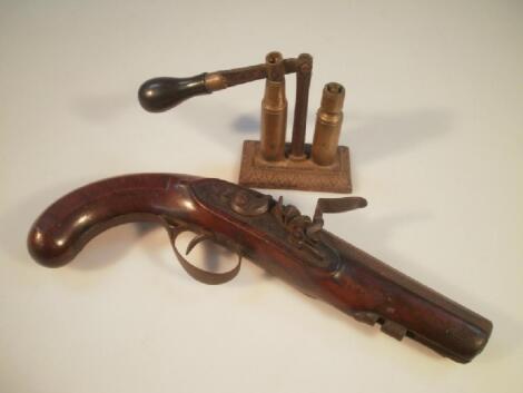 A 19thC flintlock pistol with hardwood handle