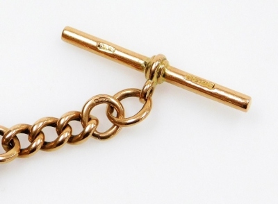 A 9ct gold kerb link Albert watch chain, with two lobster claw clasps, and T-bar as fitted, 63.3g. - 2