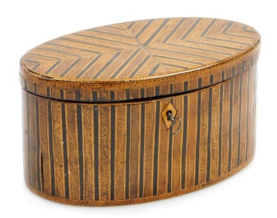 An early 19thC oval boxwood ebony and mahogany tea caddy, with chequer banded borders, the hinged lid enclosing a vacant interior, 11cm high, 20cm wide, 11cm deep. (AF)