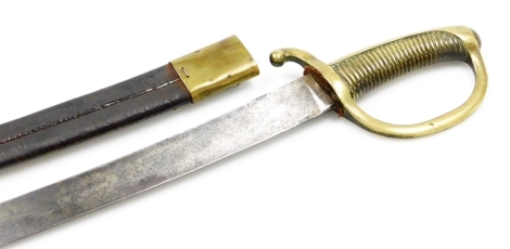 A 19thC French cavalry sabre, with leather and brass scabbard, brass grip and guard, the blade stamped Nolte, 75cm long.