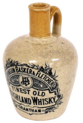 A Johnson Basker and Fletcher, Grantham stoneware whisky flagon, 19cm high.