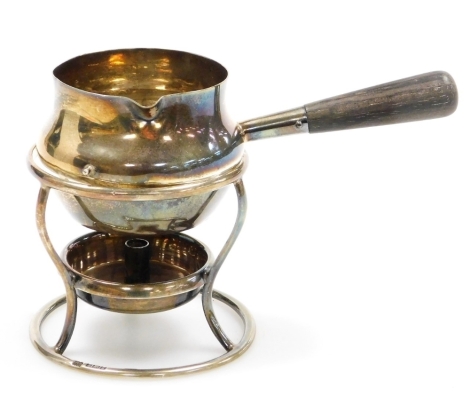 An Edward VII silver spirit burner, with ebonised handle, Birmingham 1906, weighable silver 2½oz.