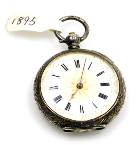 A late 19thC Swiss white metal pocket watch, open faced, key wind, the case engraved with leaves and scrolls, around a vacant cartouche, the white gilt and beige dial with Roman numerals, the case stamped 0.935, 3.5cm diameter.