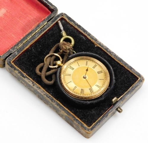 An 18ct gold pocket watch, with a floral hammered dial, and Roman numeric outer dial with black hands, key wind, with Swiss movement, 40.3g all in.