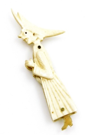 A 19thC novelty articulated bone figural carving of a French nun, possibly prisoner-of-war work, with miniature spoon and toothpick, 9cm high.