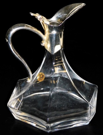 A Royal Crystal Rock Italian glass claret jug, Cristallo al Piombo, of out swept hexagonal form, with silver plated mount, spout and hinged lid, 22cm high.