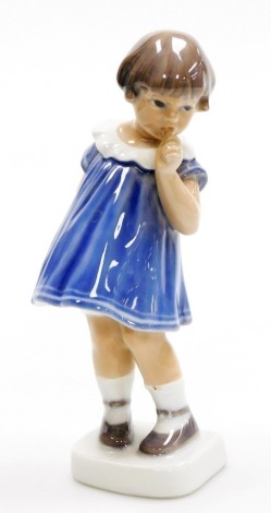 A Royal Copenhagen porcelain model of a young girl sucking her thumb, number 1026, printed marks, 19cm high.