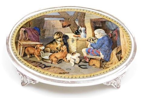 A Prattware oval pottery teapot stand, the transfer printed scene after Sir Edwin Landseer entitled Highland Music, with an electroplated mount, raised on four scroll cast feet, 23cm wide.