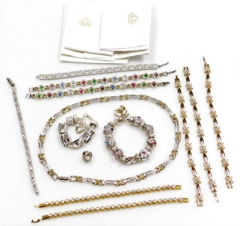 A group of costume jewellery and effects, comprising a pair of multicoloured stone set bracelets, silver plated, a silver and rectangular cut cz set tennis bracelet, a plated magnet loop bracelet, associated necklace, two further bracelets, three cross st