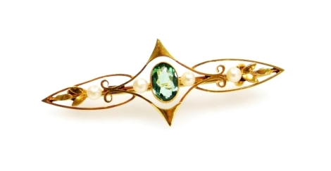 A 15ct gold and aquamarine bar brooch, with arched central section with floral design shoulders and four seed pearls, 4cm wide, 2.5g all in.