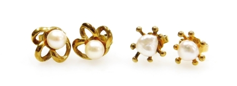 Two pairs of 9ct gold pearl earrings, comprising a pair of triple loop and cultured pearl set studs, and a pair of modern abstract design fresh water pearl studs, 2.7g all in.