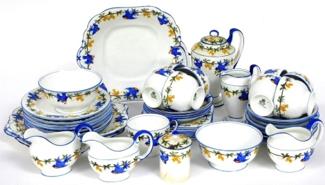 An early 20thC Aynsley porcelain part tea and coffee service, decorated with swallows and yellow flowers, printed marks, comprising coffee pot, two milk jugs, cream jugs and sugar bowls, preserve pot and cover, three bread plates, six sandwich plates, fou