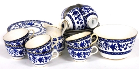 A late 19thC Royal Doulton porcelain part tea service, decorated in blue and white with a floral pattern, printed marks, comprising sugar bowl, cream jug, ten tea cups, eight saucers and tea plates.