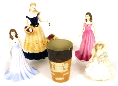 A group of ceramics, comprising Royal Doulton figures of Diamond, and Ruby, Royal Worcester figures of Cherry, and Lucy, and a Royal Doulton two tone stoneware beaker. (5)